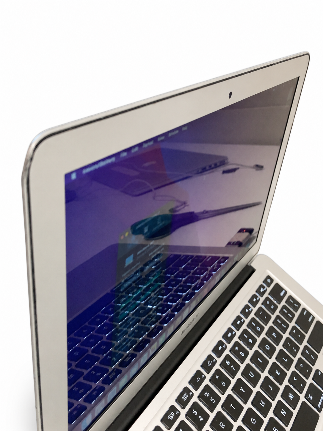 Actual Apple MacBook Air Early 2015 angled left view on white background