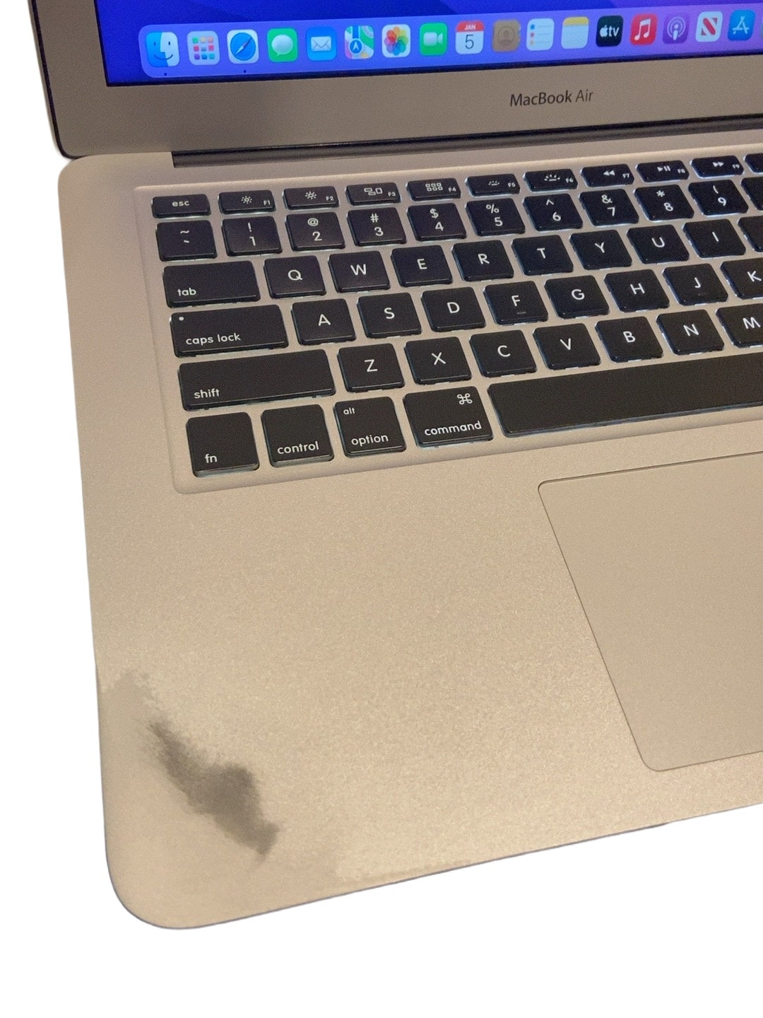 Actual Apple MacBook Air Early 2015 Core i7 palm rest condition on white background